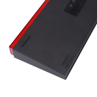Bottom view of GAMEON PRIMEX GO-MK260-RS 60% RGB mechanical keyboard showing non-slip rubber feet and red accent frame.
