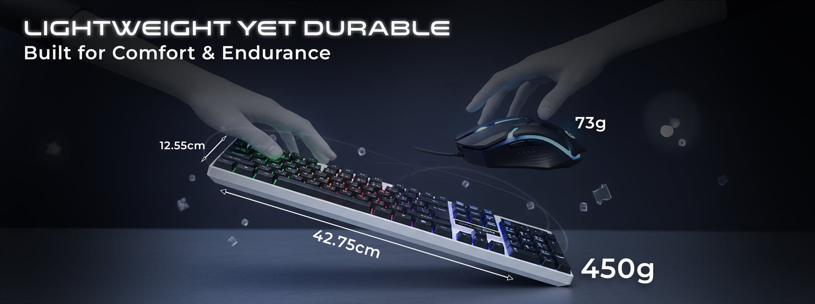 Hands holding the GAMEON DOMINION Series GO21KM-B RGB Wired Keyboard & Mouse Combo, highlighting lightweight design - 450g keyboard and 73g mouse. Dimensions labeled as 42.75 cm × 12.55 cm with RGB lighting, emphasizing comfort and durability.