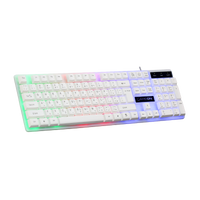 Angled top-left view of GAMEON DOMINION Series GO21KM-W RGB Wired Keyboard, showing multi-zone rainbow lighting, slim design, and full English/Arabic key layout with numeric keypad.