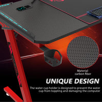 GAMEON Phantom XL-R Series L-Shaped RGB Flowing Light Gaming Desk With Mouse pad, Headphone Hook, Cup Holder, Cable Management, Gamepad Holder, Qi Wireless Charger & USB Hub - Black